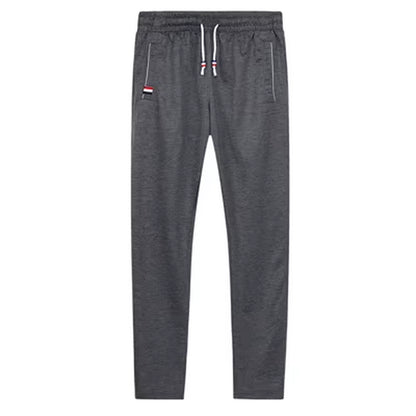 DIMUSI Mens Joggers Casual Pants Fitness Men Sportswear Tracksuit Bottoms Skinny Sweatpants Trousers Gyms Jogger Track Pants 6XL