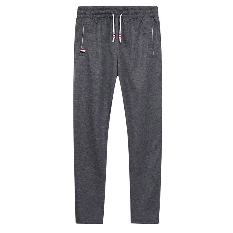 DIMUSI Mens Joggers Casual Pants Fitness Men Sportswear Tracksuit Bottoms Skinny Sweatpants Trousers Gyms Jogger Track Pants 6XL