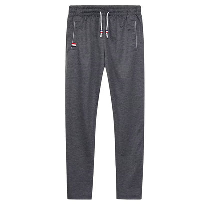DIMUSI Mens Joggers Casual Pants Fitness Men Sportswear Tracksuit Bottoms Skinny Sweatpants Trousers Gyms Jogger Track Pants 6XL